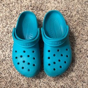 Teal Crocs